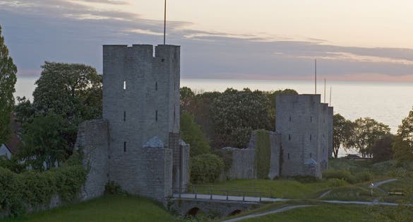 photo of Visby medieval city wall during sunrise on the island Gotland in Sweden.