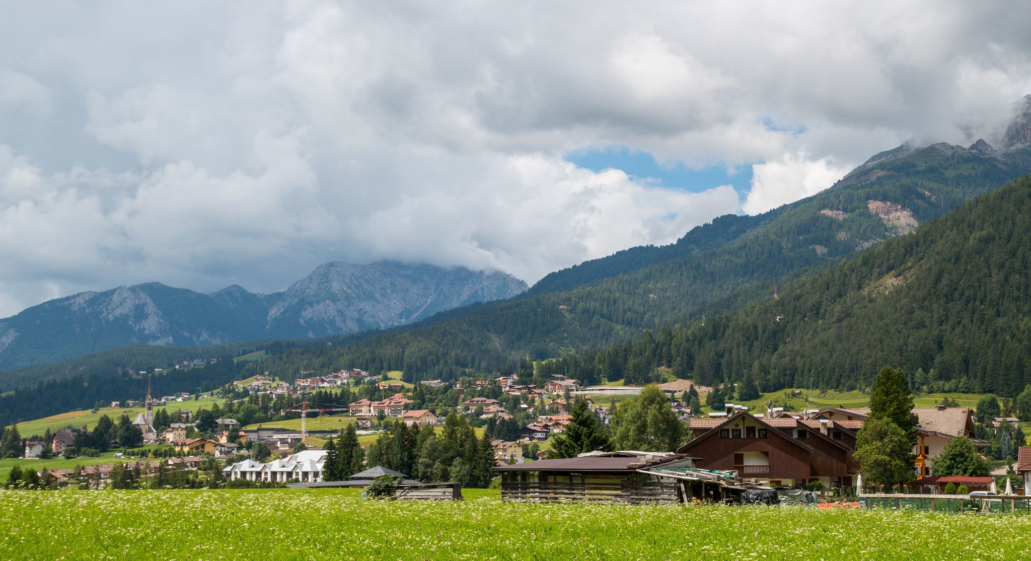 photo of Glimpses of the mountain village of San Giovanni di Fassa, Vigo di Fassa, Val di Fassa, Trento, Trentino Alto Adige, Italy.