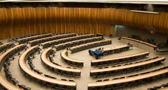 photo of a conference room in the Palace of Nations in Geneva, Switzerland.