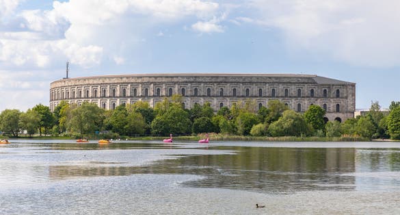 Panorama view of the Documentation Center and Congress Hall of the Nazi Party Rally Grounds in Nuremberg, with the Dutzendteich lake in the foreground, Bavaria, Germany
