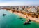 Photo of aerial view of touristic Portimao with wide sandy Rocha beach, Algarve, Portugal.