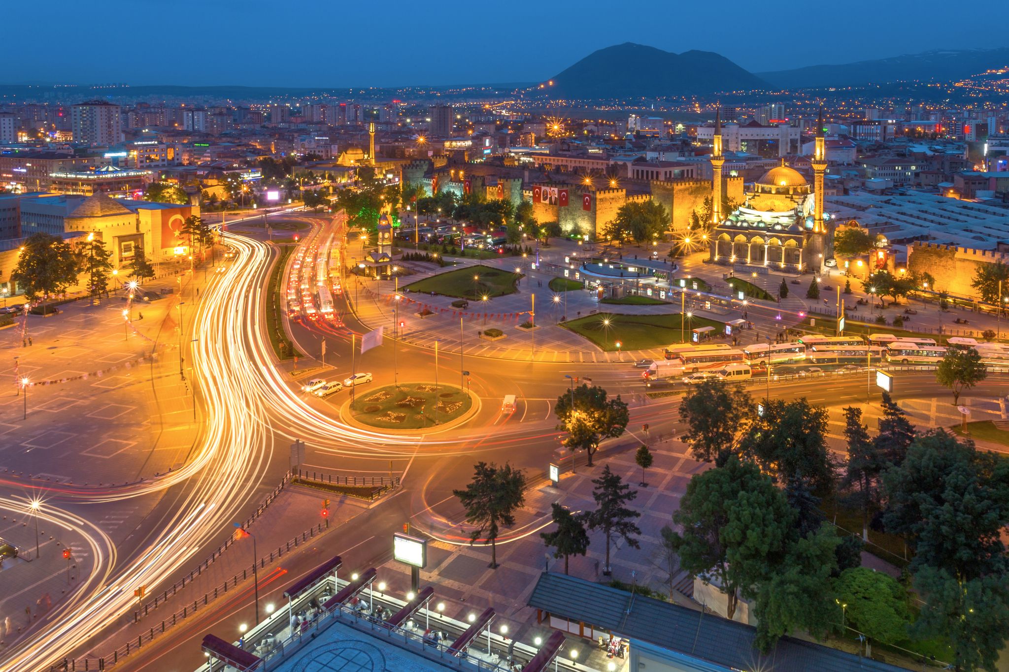 photo of aerial night view of Bürüngüz Mosque at kayseri city center in Turkey.