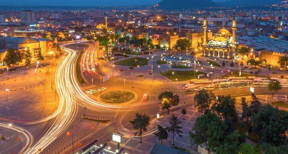 photo of aerial night view of Bürüngüz Mosque at kayseri city center in Turkey.