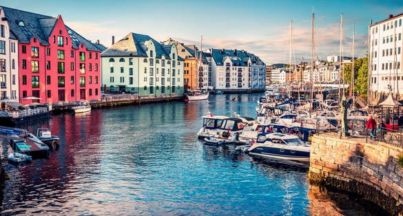 Great summer view of Alesund port town on the west coast of Norway, at the entrance to the Geirangerfjord. 