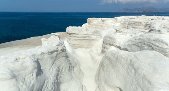 photo of Milos, Greece, Cyclades Islands, 09/13/2012: the white rock of Sarakiniko cliff .