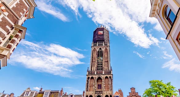 photo of beautiful sunny day at Dom Tower of Utrecht, the Netherlands.