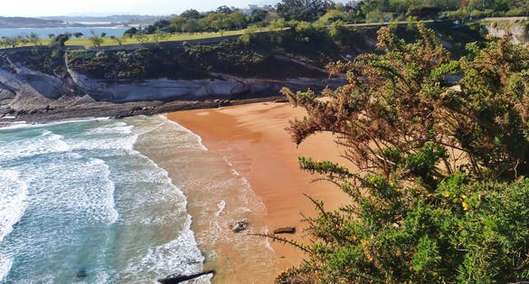 Photo of Aerial view from above of Mataleñas beach (Playa de Mataleñas) in Santander, Cantabria, Spain .