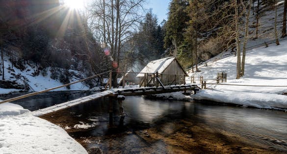 Photo of Wooden cottage in Kvacianska valley in Slovakia during winter season.