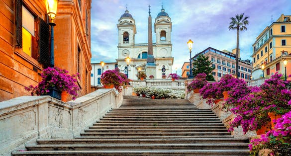 photo of Piazza di Spagna in Rome, italy. Spanish steps in Rome, Italy in the morning. One of the most famous squares in Rome, Italy. Rome architecture and landmark.