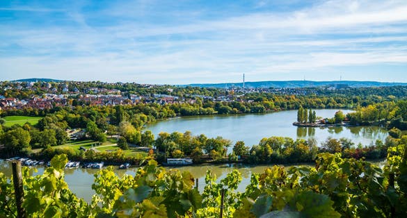 Photo of Germany, Stuttgart panorama view max eyth see lake water neckar river boats and beautiful houses.