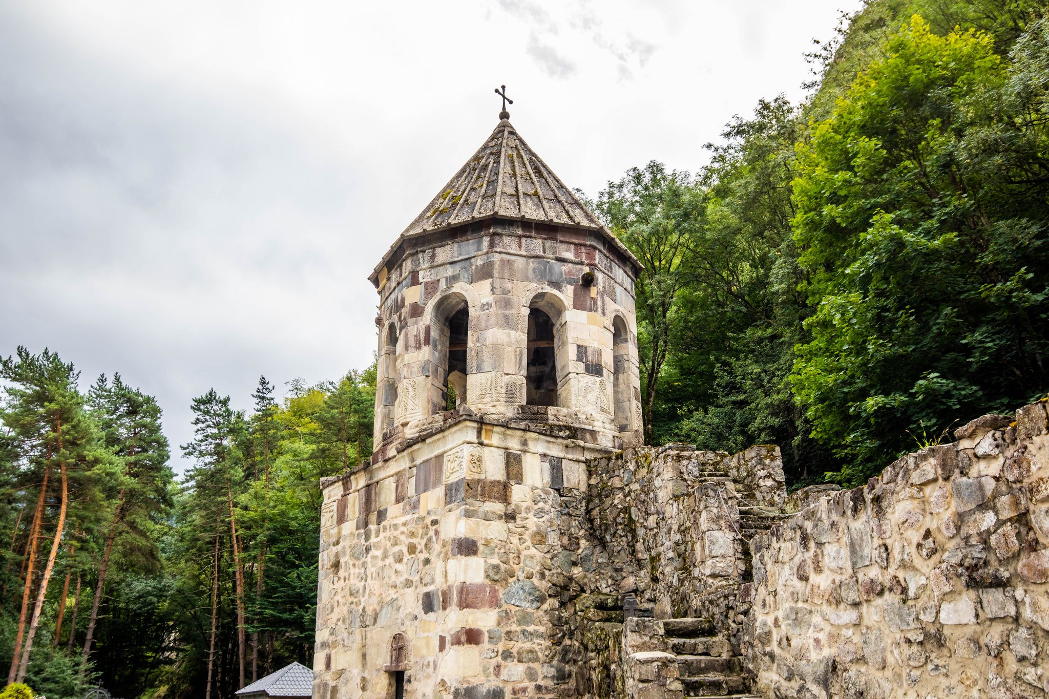 Photo of Mtsvane Monastery bell tower near Batumi Georgia pilgrimage destination at day.