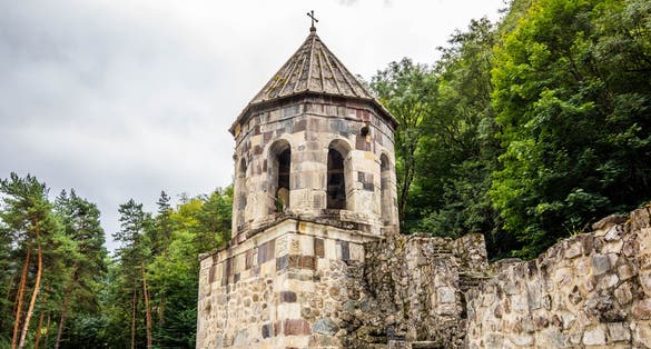 Photo of Mtsvane Monastery bell tower near Batumi Georgia pilgrimage destination at day.