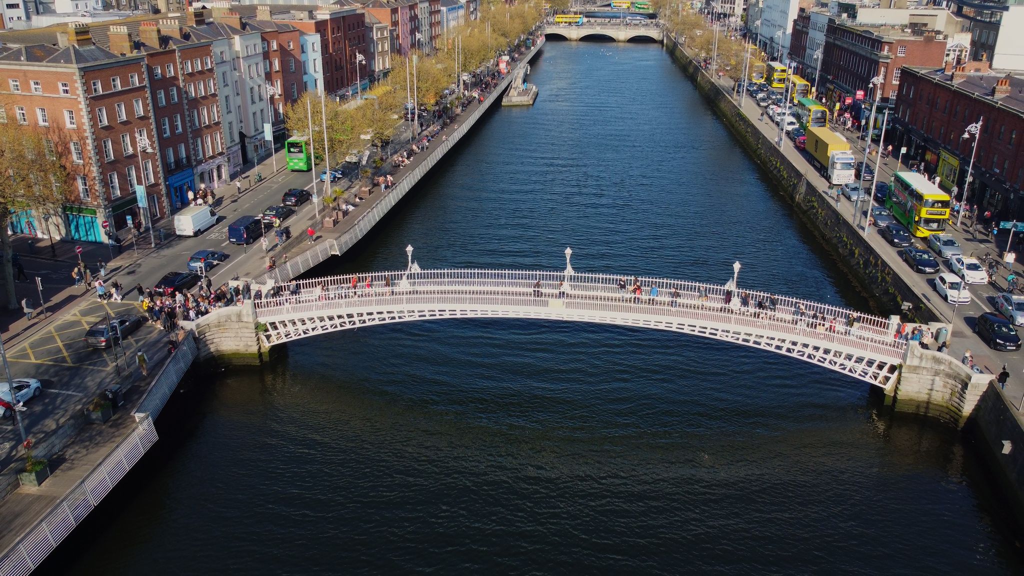 Photo of aerial view of the most famous bridge in Dublin called "Half penny bridge" due to the toll charged for the passage.