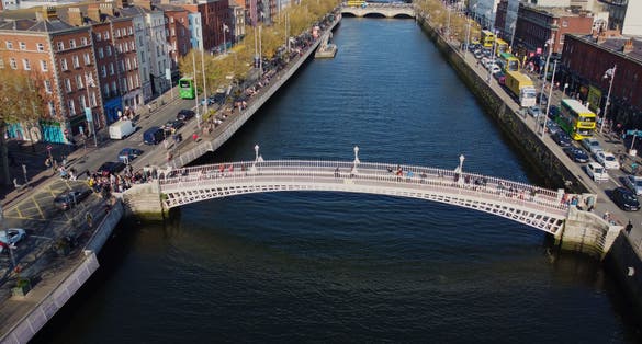 Photo of aerial view of the most famous bridge in Dublin called "Half penny bridge" due to the toll charged for the passage.