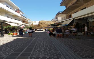 Photo of aerial view of Chania with the amazing lighthouse, mosque, venetian shipyards, Crete, Greece.