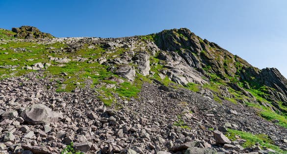 Djevelporten or Devils gate in Floya mountain hiking trail. Svolvaer trekking trail in Lofoten island, Scandinavia, Norway, activity famous places