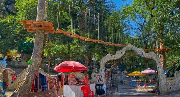 Photo of Borjomi central park with children playgrounds and relaxation zones, Georgia.