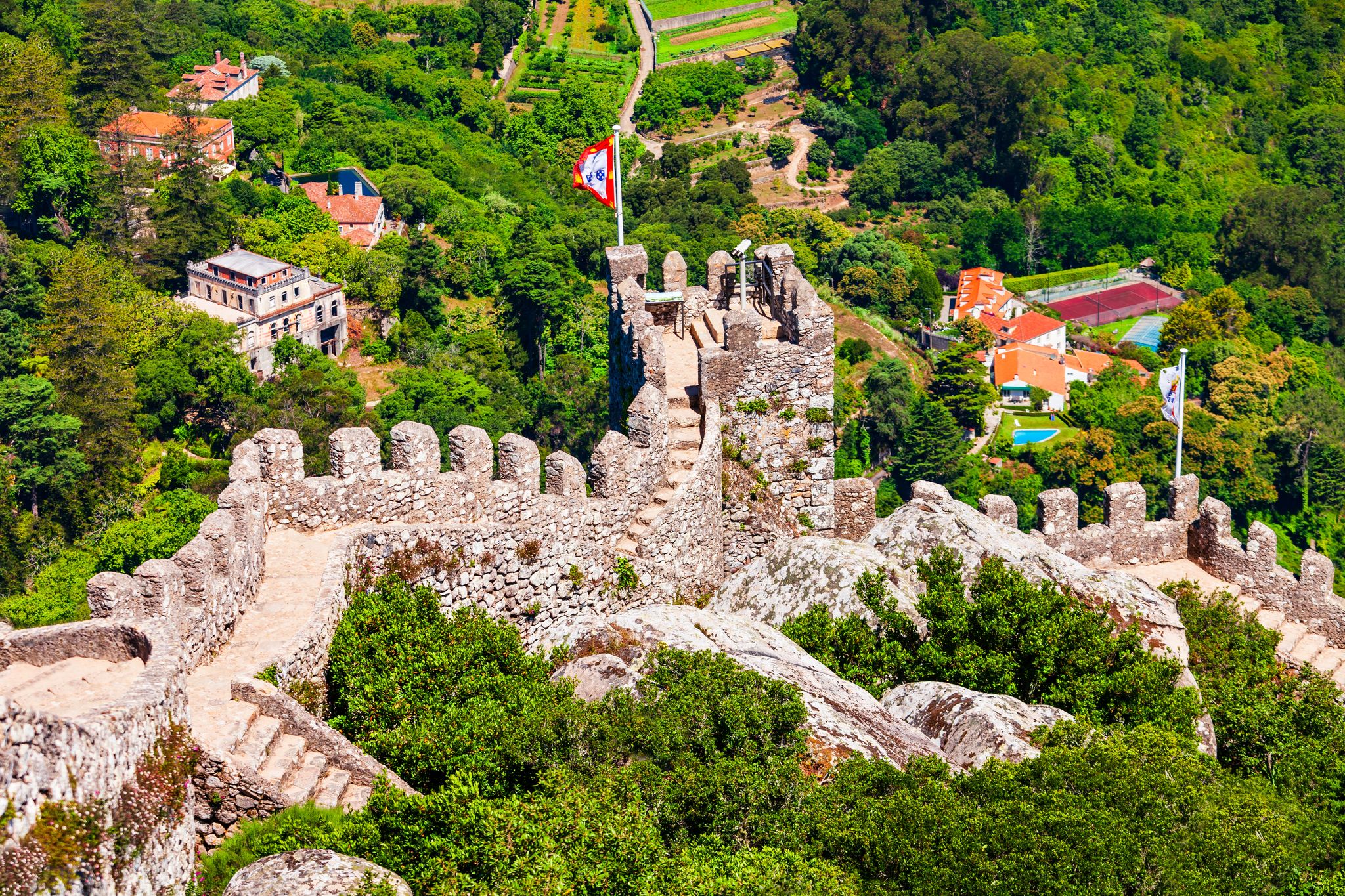 Photo of Castle of the Moors or Castelo dos Mouros is a hilltop medieval castle in Sintra town near Lisbon, Portugal.