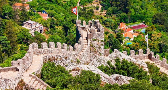 Photo of Castle of the Moors or Castelo dos Mouros is a hilltop medieval castle in Sintra town near Lisbon, Portugal.