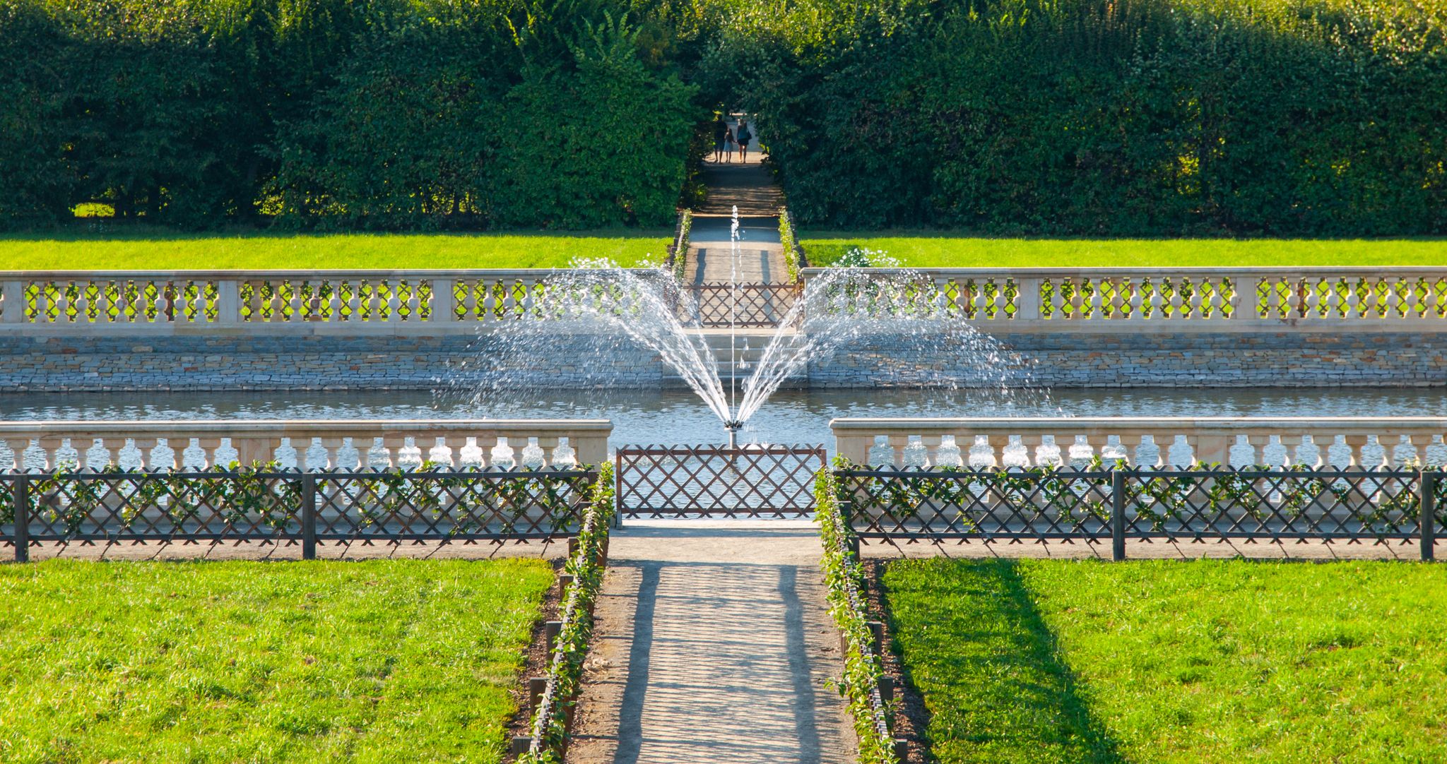 Photo of Kromeriz Flower Garden in french style with green lawns and fountain, Czech Republic.