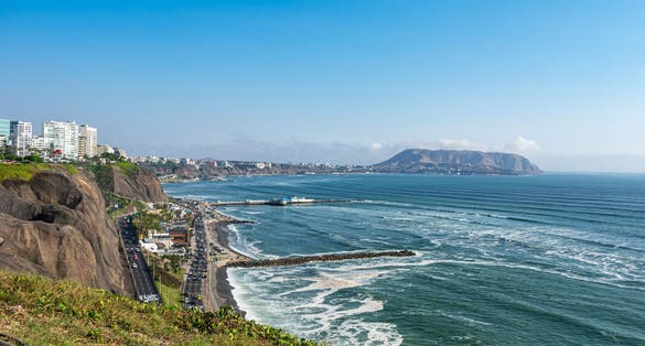 Photo of Splendid natural and city landscape by the sea on the green coast of Miraflores - Peru.
