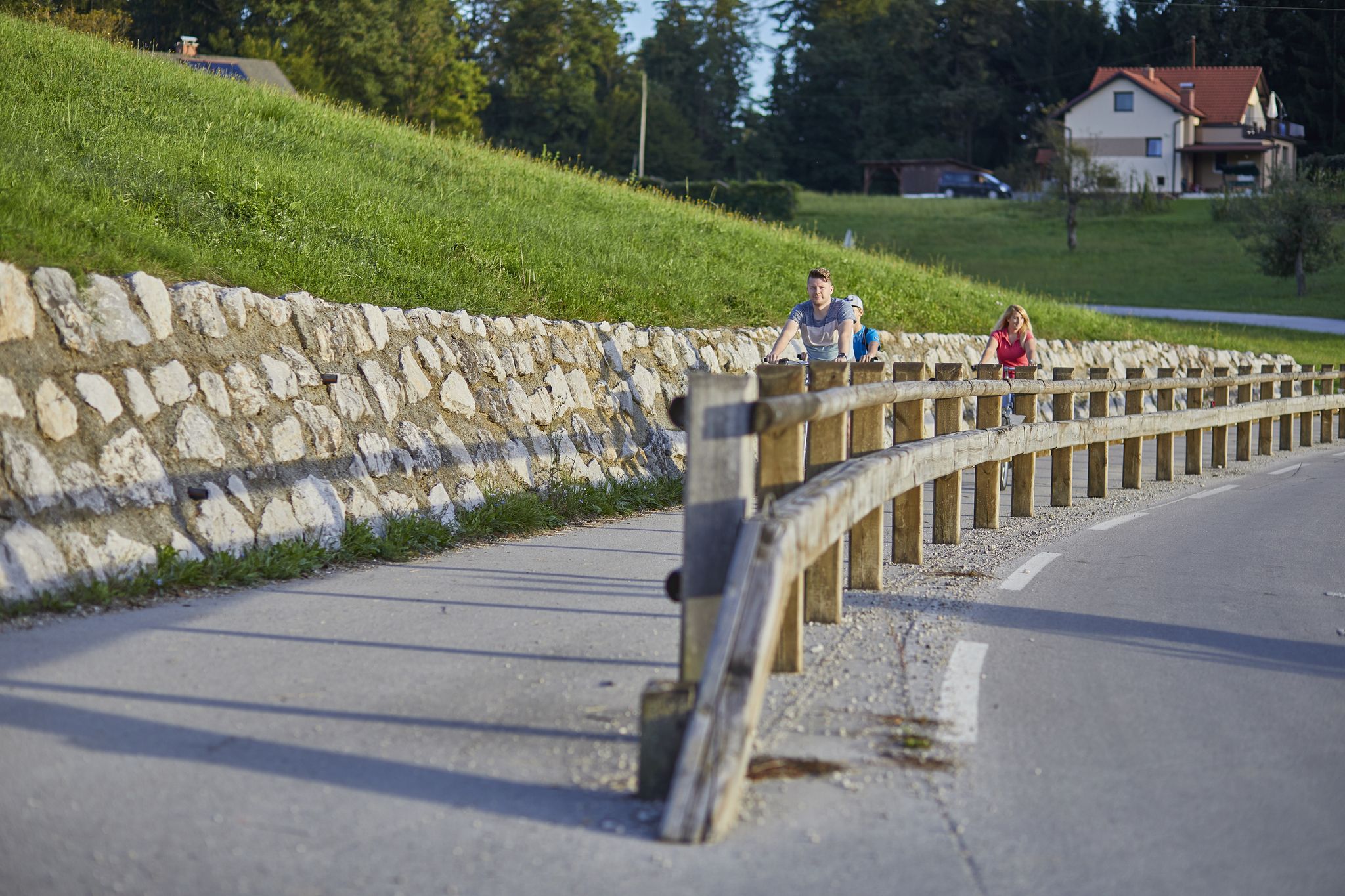 The people riding bicycles through a road in the Celje municipality in Slovenia