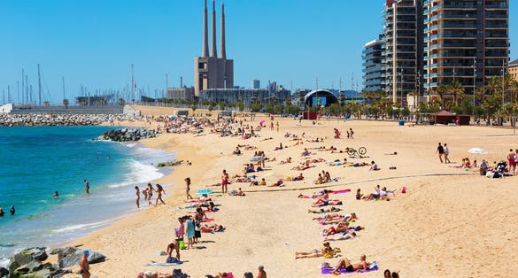 Mediterranean sand beach in Badalona, Spain. It is one of centers of a beach holiday in Europe.