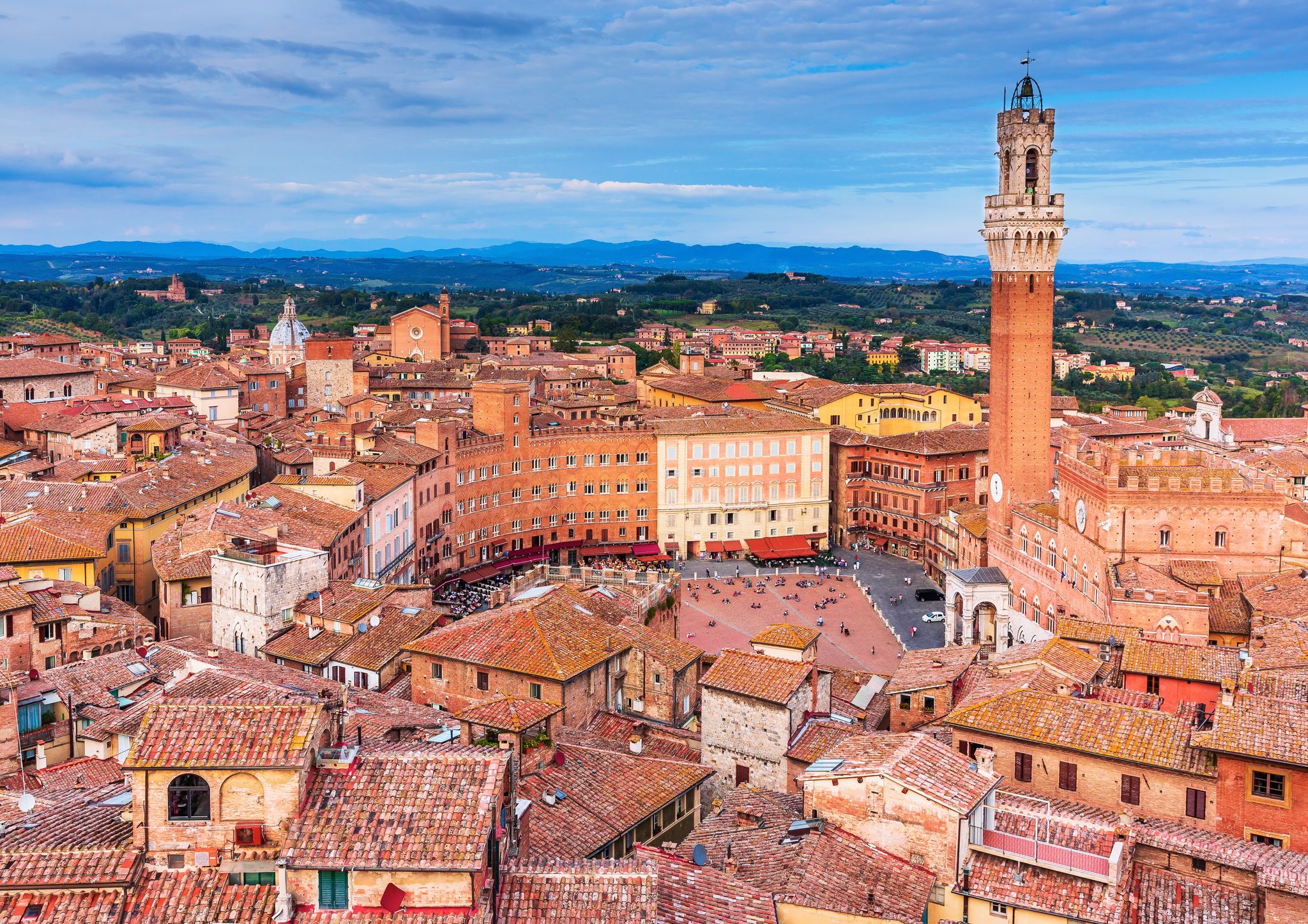 photo of siena, Italy. Aerial view of piazza del campo with palazzo pubblico and torre del mangia.