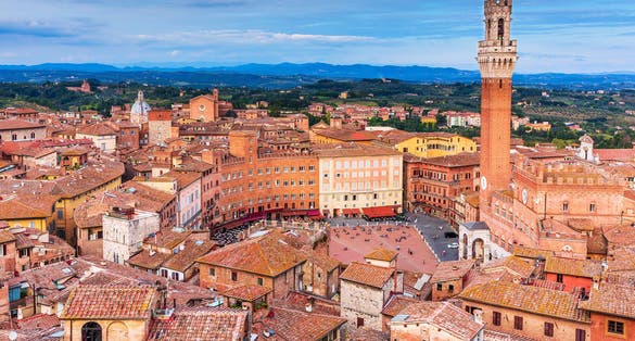 photo of siena, Italy. Aerial view of piazza del campo with palazzo pubblico and torre del mangia.
