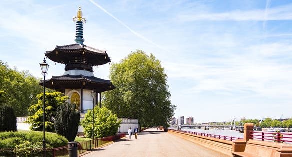 Photo of 'Will Make Tranquil This Realm of Mine'  on the East niche of the beautiful Peace Pagoda in Battersea Park, London, UK.