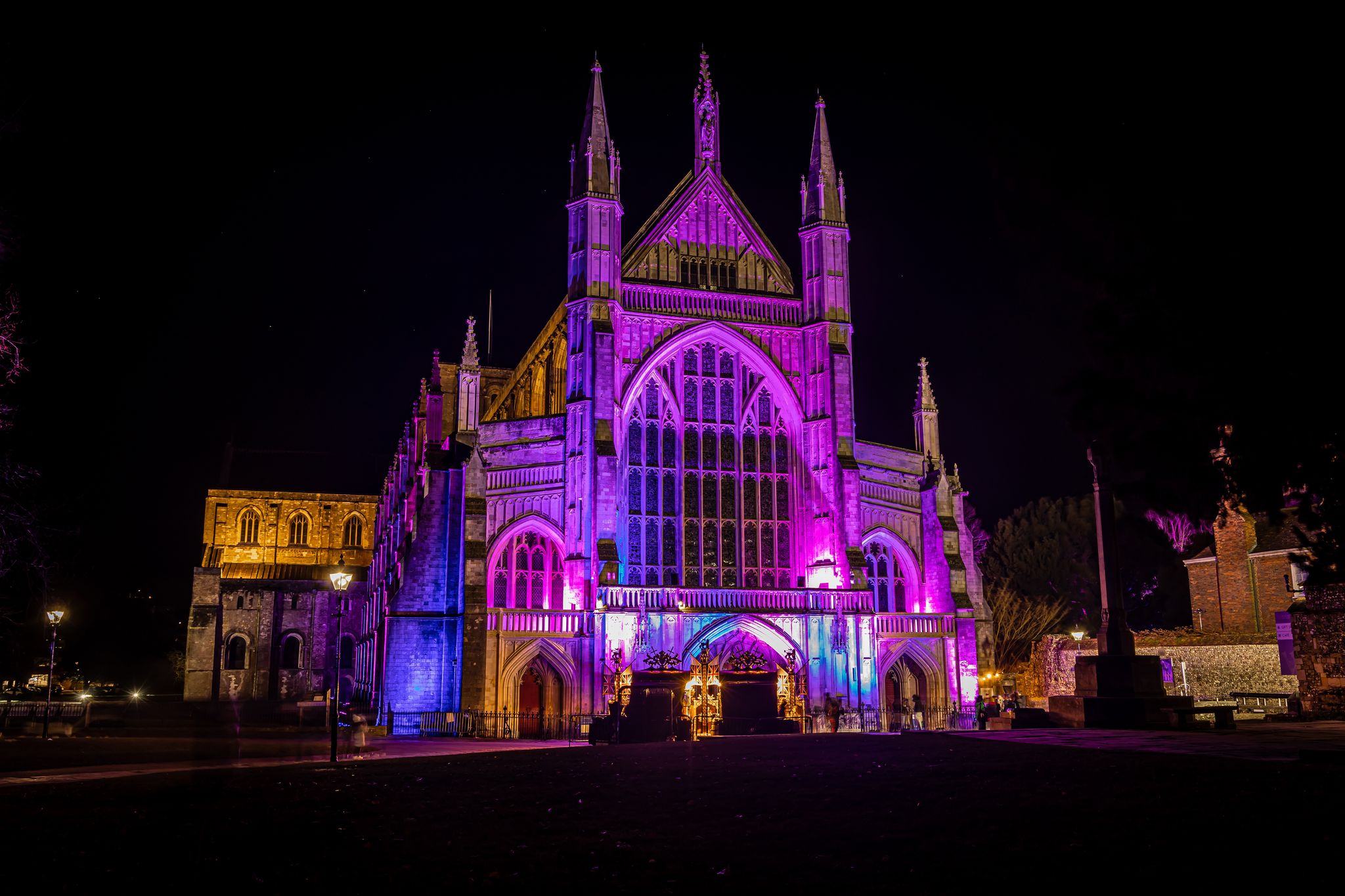 Photo of a night view of Winchester Cathedral, Hampshire, during Christmas time, UK.