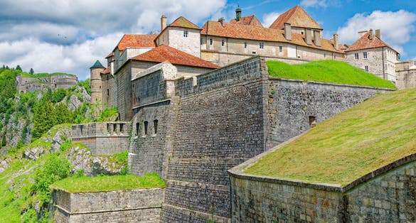 photo of view of The Château de Joux is a castle, later transformed into a fort, located in La Cluse-et-Mijoux.
