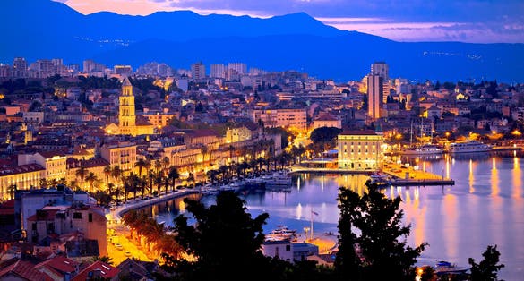 Photo of aerial evening view of Split waterfront from Marjan hill, Dalmatia, Croatia.