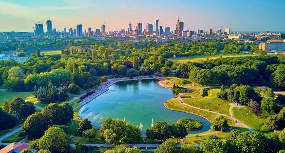 Photo of a beautiful panoramic aerial view of the sunset in a fabulous evening at Pola Mokotowskie in Warsaw, Poland.