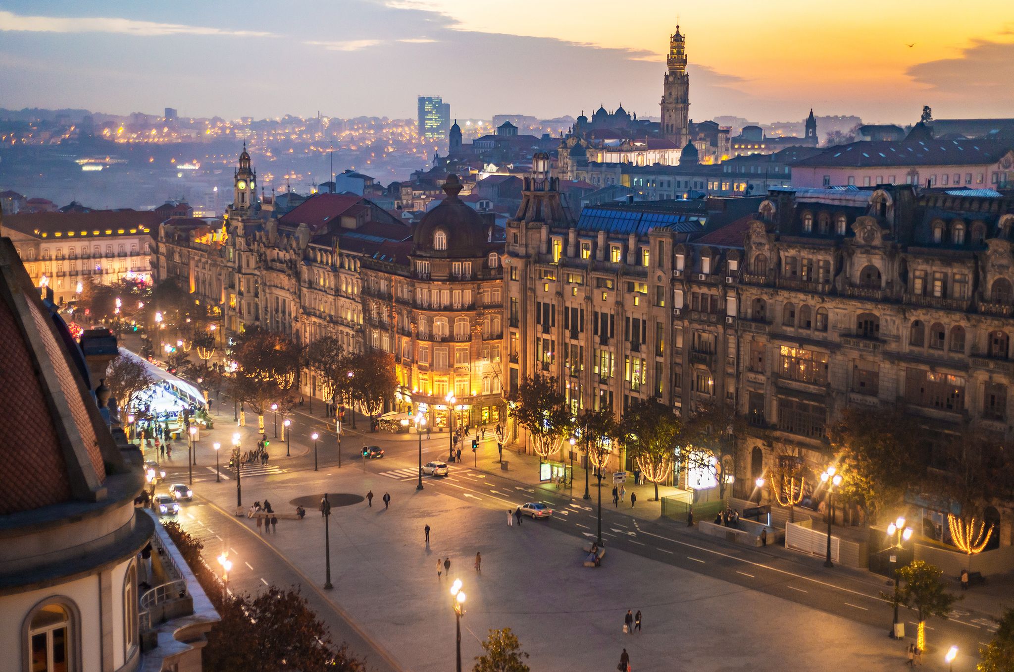 Photo of Aerial view of Aliados / Liberdade Square and Clerigos Tower town of Porto. Sunset view with winter Christmas tree, Portugal.