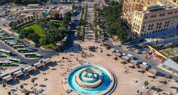 Photo of aerial view of Iconic Triton fountain in front of the Valletta, capital city of Malta.