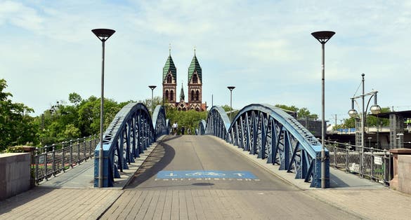 photo of blue bridge in Freiburg im Breisgau in Germany.