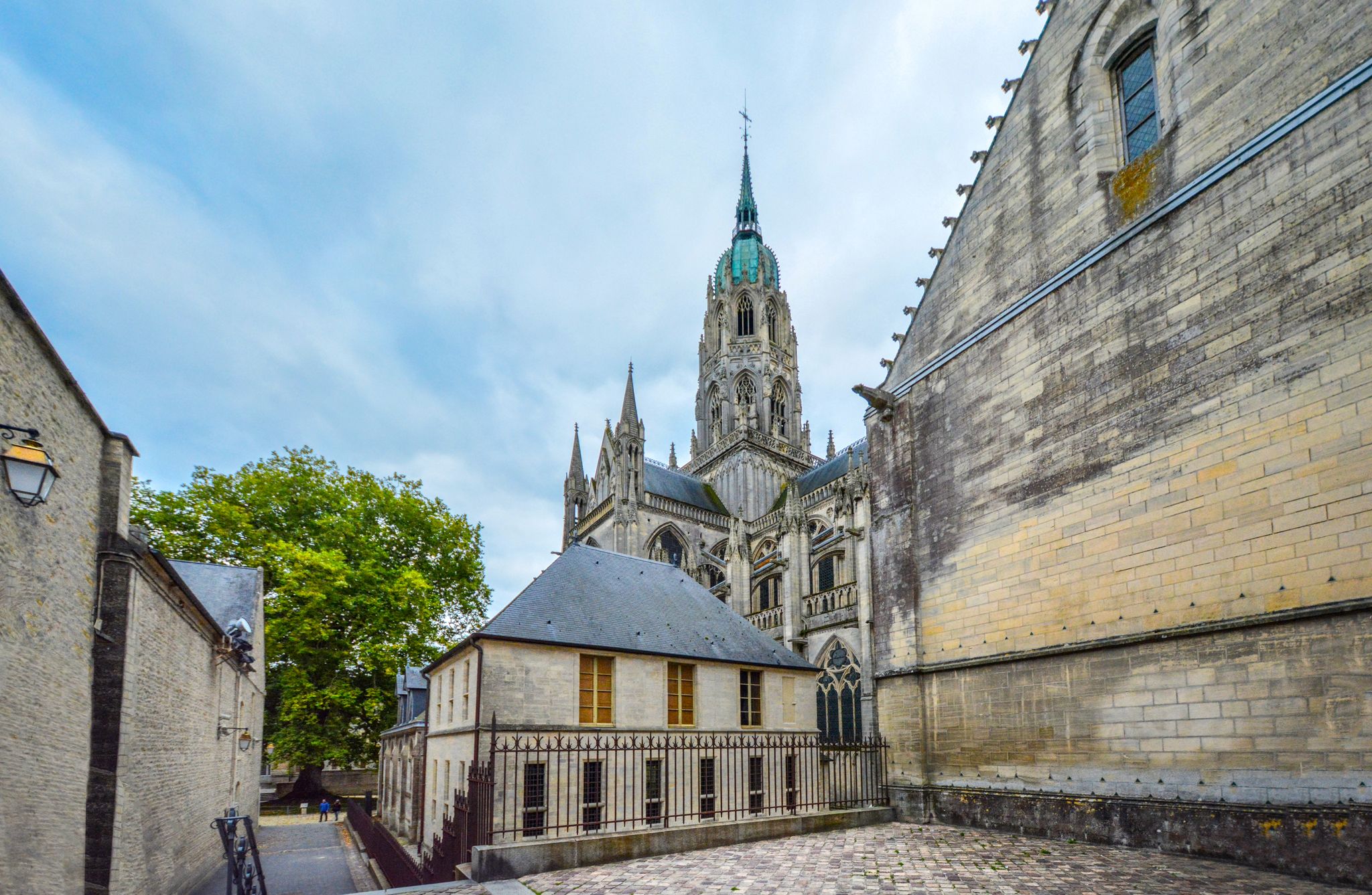 Photo of the tower and dome of the medieval Cathedral of Our Lady of Bayeux, is a Roman Catholic church located in the town of Bayeux in Normandy, France.