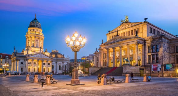 Photo of Panoramic view of famous Gendarmenmarkt square at night in Berlin Mitte district, Germany