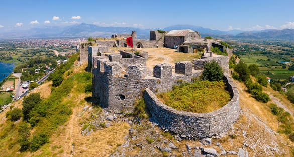 photo of an aerial view of the ruins of the Rozafa Castle located in the city of Shkoder in Albania.