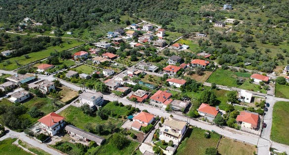 photo of Igoumenitsa Greek village of faskomilia aerial photo beautiful architecture Greek village buildings and streets close to Scorpiona, town of Plataria, Sivota and Parga Preveza Greece.