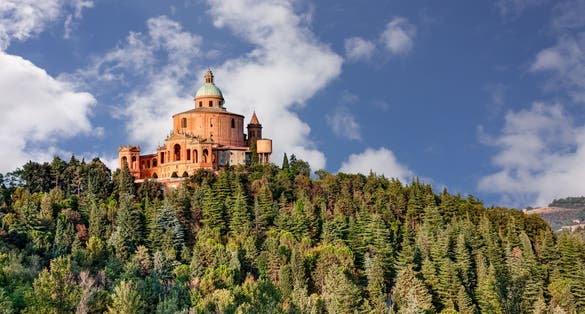 Photo of ancient sanctuary of the Madonna di San Luca, old church on the hill.