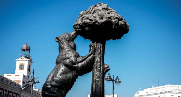 photo of Statue of the Bear and the Strawberry Tree in Madrid, Spain. It represents the coat of arms of Madrid and is found on the east side of the Puerta del Sol.