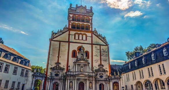 Photo of Famous St. Matthias' Abbey or Benediktinerabtei St. Matthias in Trier, Germany. A renowned place of pilgrimage because of the tomb of Saint Matthias the Apostle.