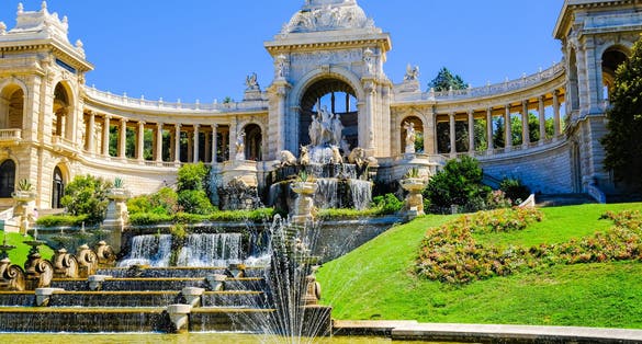Photo of Marseille. Palais de Longchamp with fountains and sculptures, in sunny day, view from the right side.