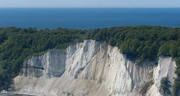 Photo of Møns Klint, the iconic white cliffs of Denmark on a bright autumn day.