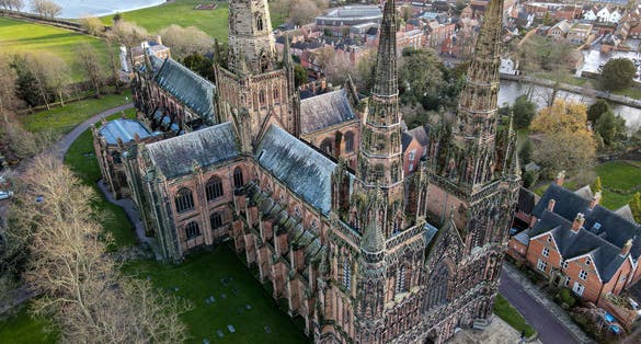 Photo of aerial view of ancient Medieval Cathedral in Lichfield, United Kingdom.