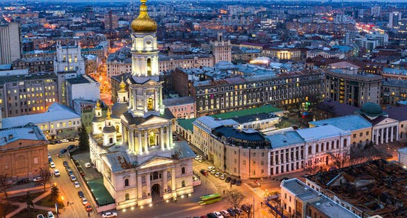Photo of aerial view of Assumption Cathedral at night in Kharkiv, Ukraine.