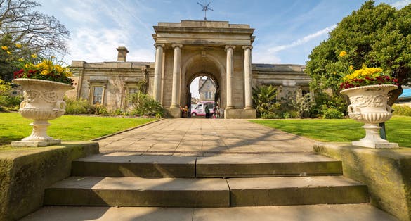 Photo of steps and gate house at the Sheffield Botanical Gardens, South Yorkshire, England, UK.