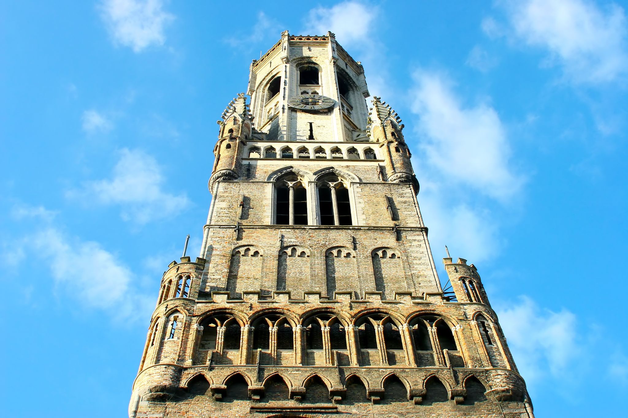 Photo of Belfry tower architecture in Markt square, in Bruges, Belgium.
